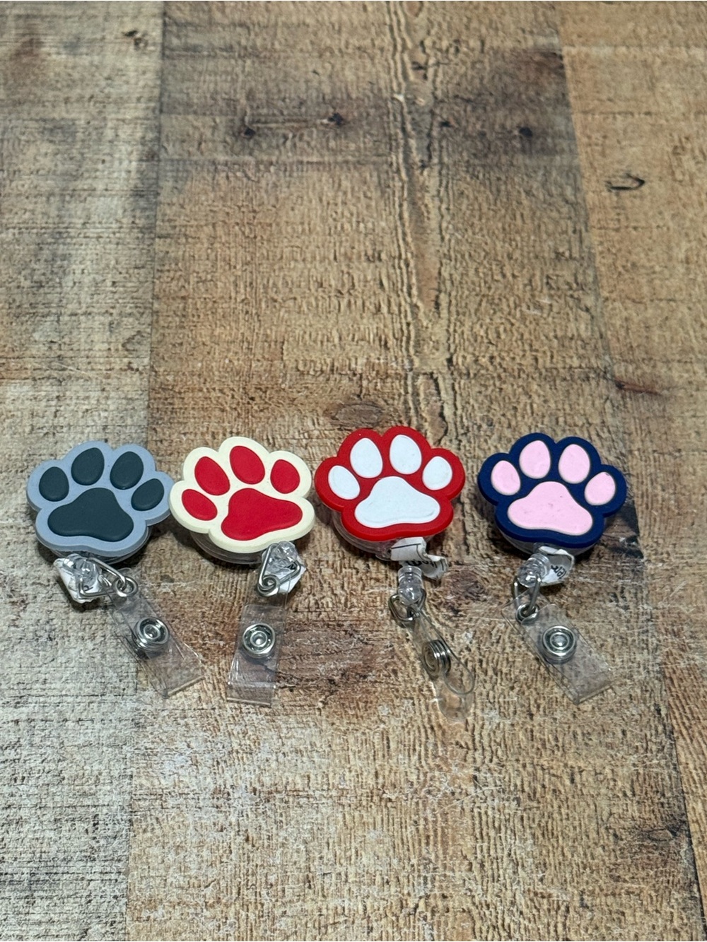 4 dog paw badge reel holders 
New 
You will receive all 4